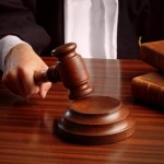 judge hand with gavel